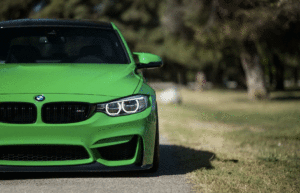 Green car on the road