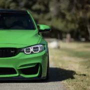 Green car on the road