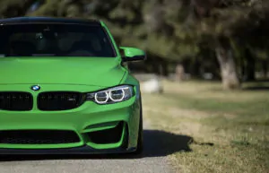 Green car on the road